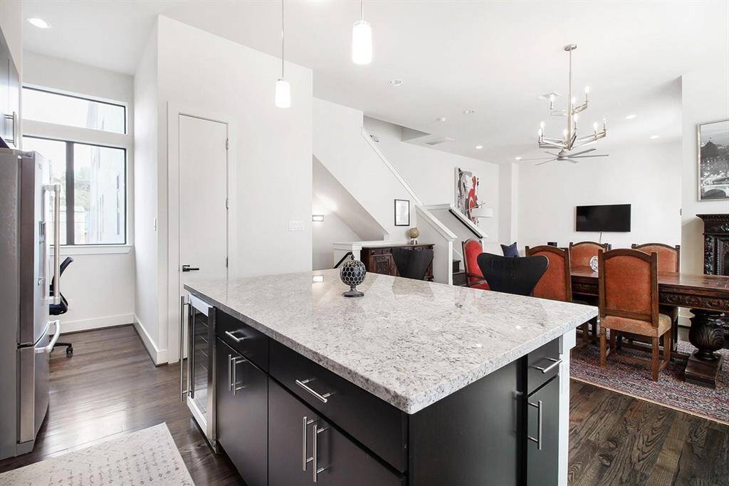 The kitchen is accented with a large island, perfect for entertaining.