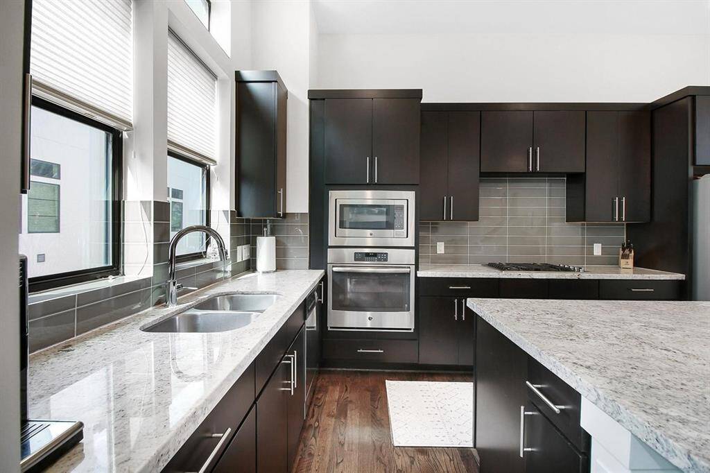 So well appointed... granite, stainless steel appliances and contemporary cabinetry.