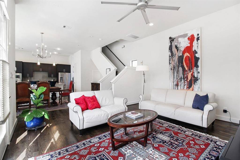 The living area boasts rich hardwood floors, high ceilings and offers ample space for almost any sized furniture.