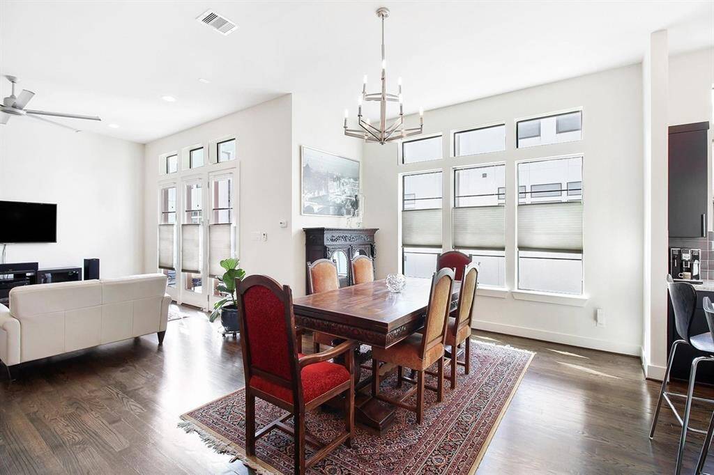 The formal dining area is conveniently located between the kitchen and living room.