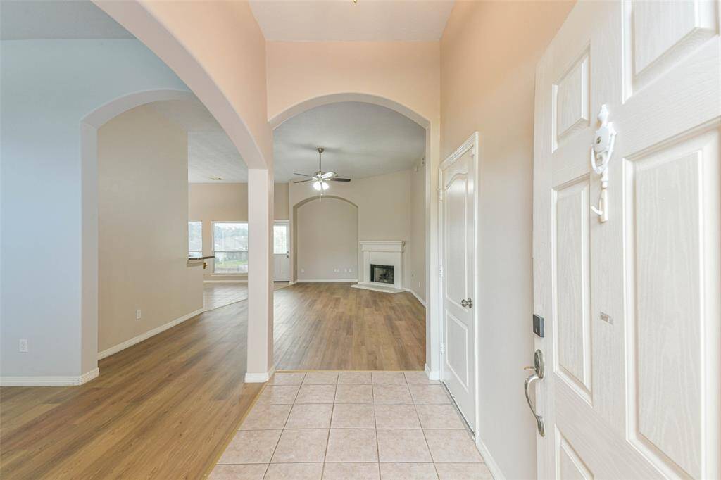 Welcome in! Welcoming entry with fresh paint and open sightlines into the home.