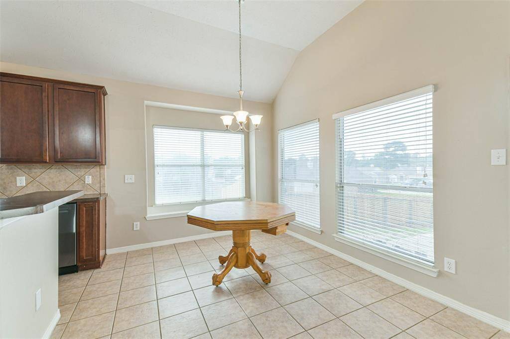 Sunny nook ideal for casual meals or morning coffee.