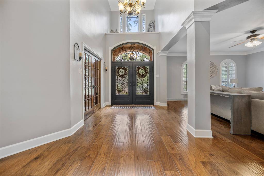 Inviting entrance with double iron doors.
