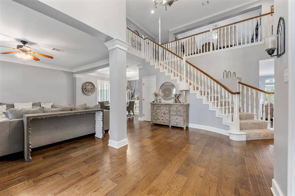 Upon entering you are greeted with the grand staircase, formal living, formal dining and main office.