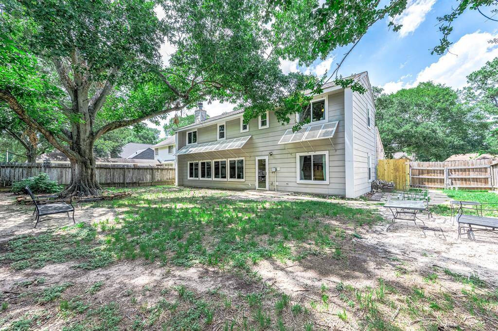 Character flows to the outside of the home as well with mature trees in the front and backyard.