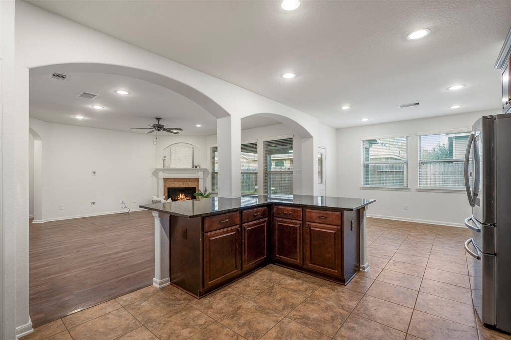 Beautiful curved arches bring in character to the home.