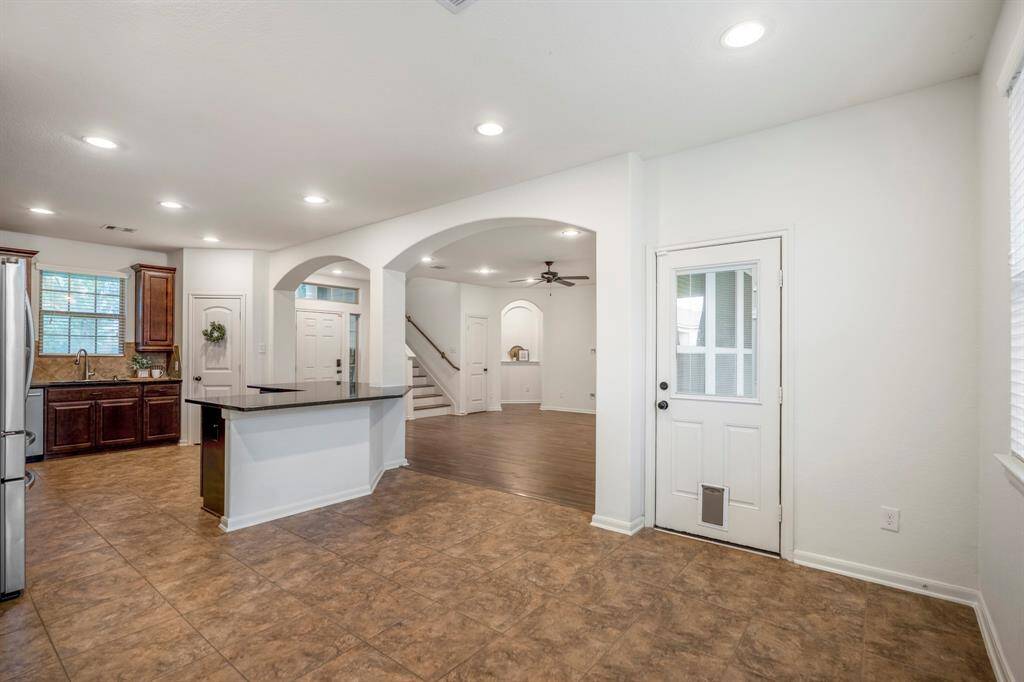 Enjoy seamless interaction with friends and family from the dining table to the kitchen and living room.