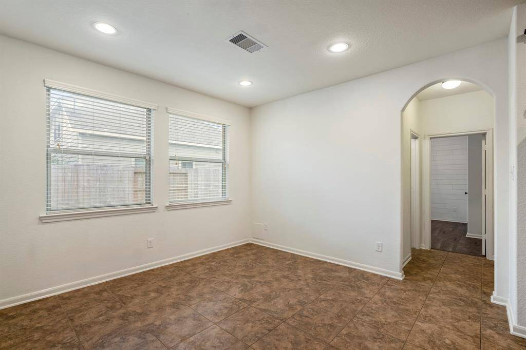 Discover the convenient access to the downstairs guest bathroom and bedroom.