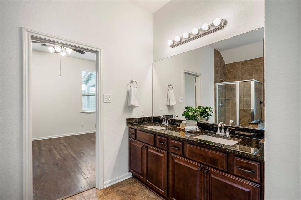 Spacious double sinks with ample storage.