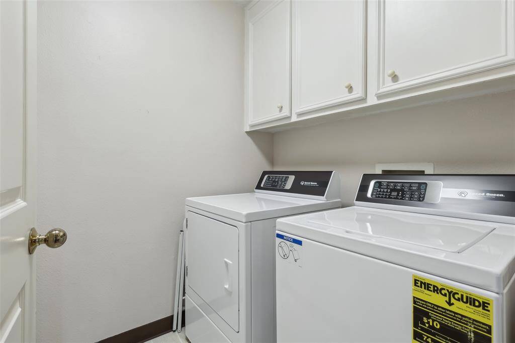 Conveniently located utility room upstairs, providing easy access and enhancing the functionality of the home