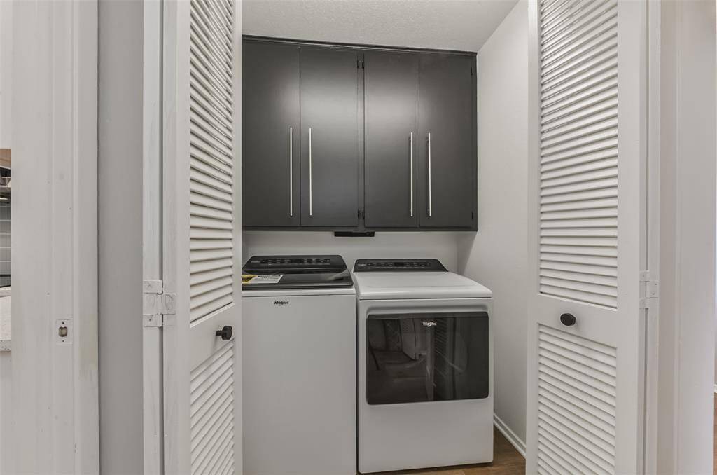 WASHER AND DRYER with storage cabinet above (additional $50 rent).