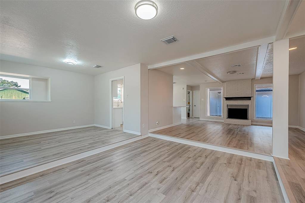 Open and breathable floor plan, freshly painted and contemporary light fixtures.