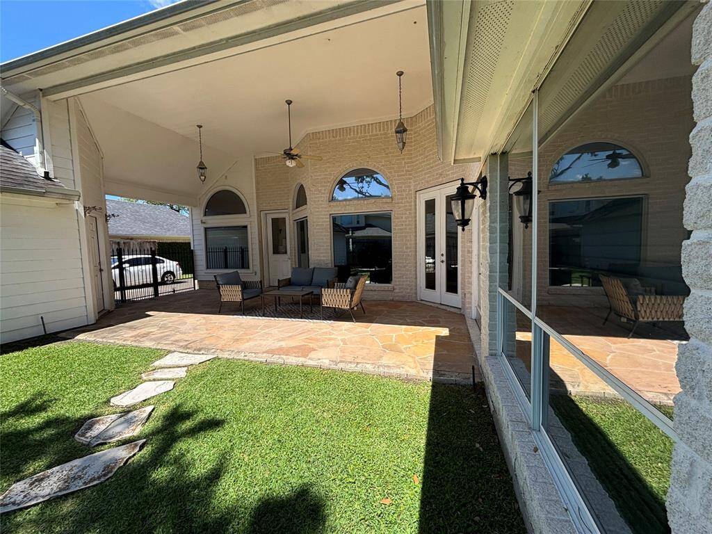 Charming kitchen with sleek cabinetry, granite countertops, and a convenient wine fridge for entertaining.