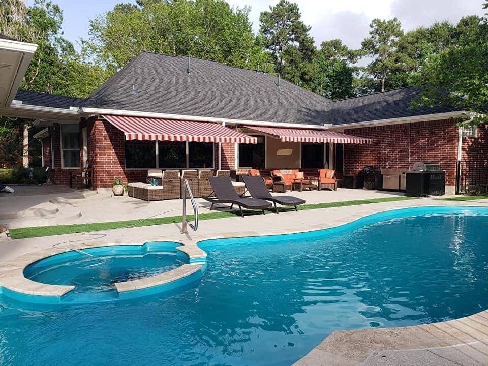 A beautiful saltwater pool and spa with awnings for shade when entertaining family and friends.