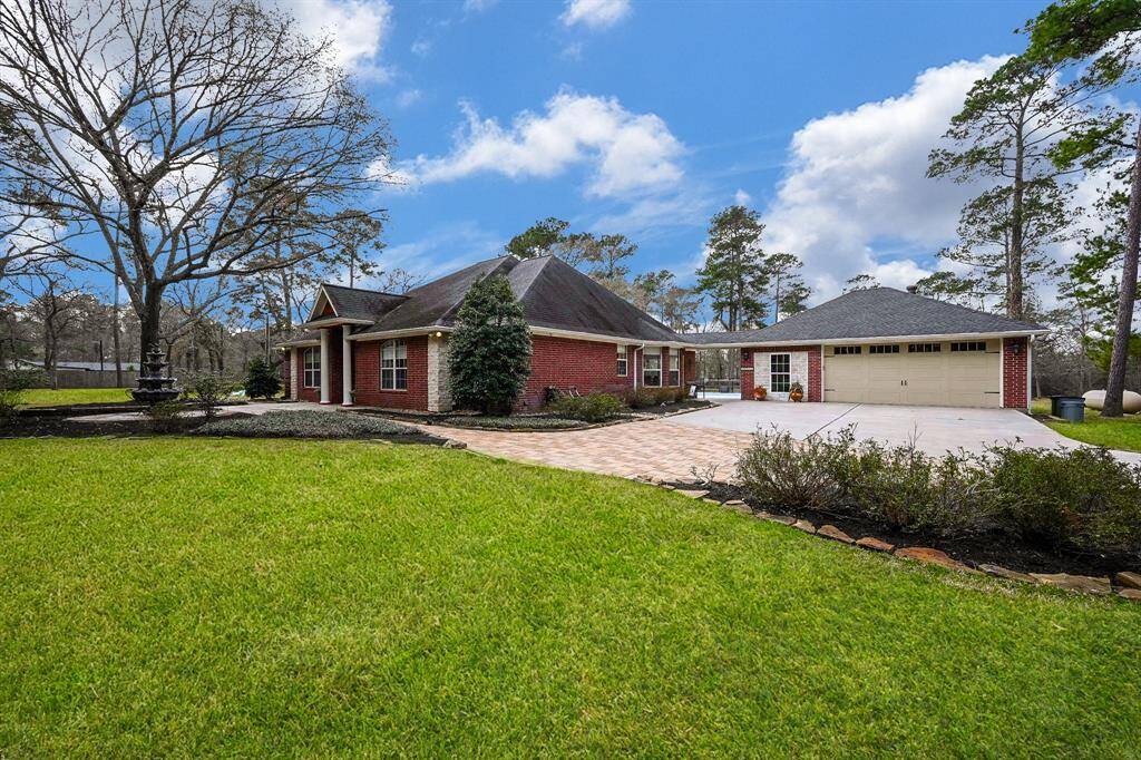After entering through the private entry gate and paved driveway, you have arrived to 23442 Hillcrest dr.