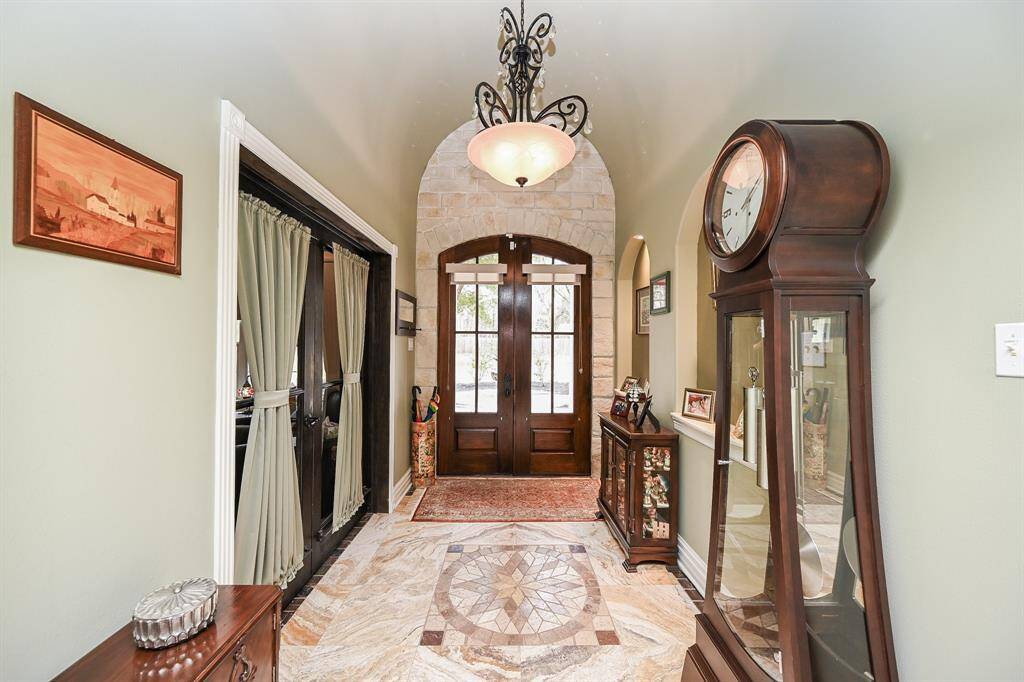 View of the foyer inside the house...All entry areas of home are large enough for wheelchairs or large grandfather clocks.