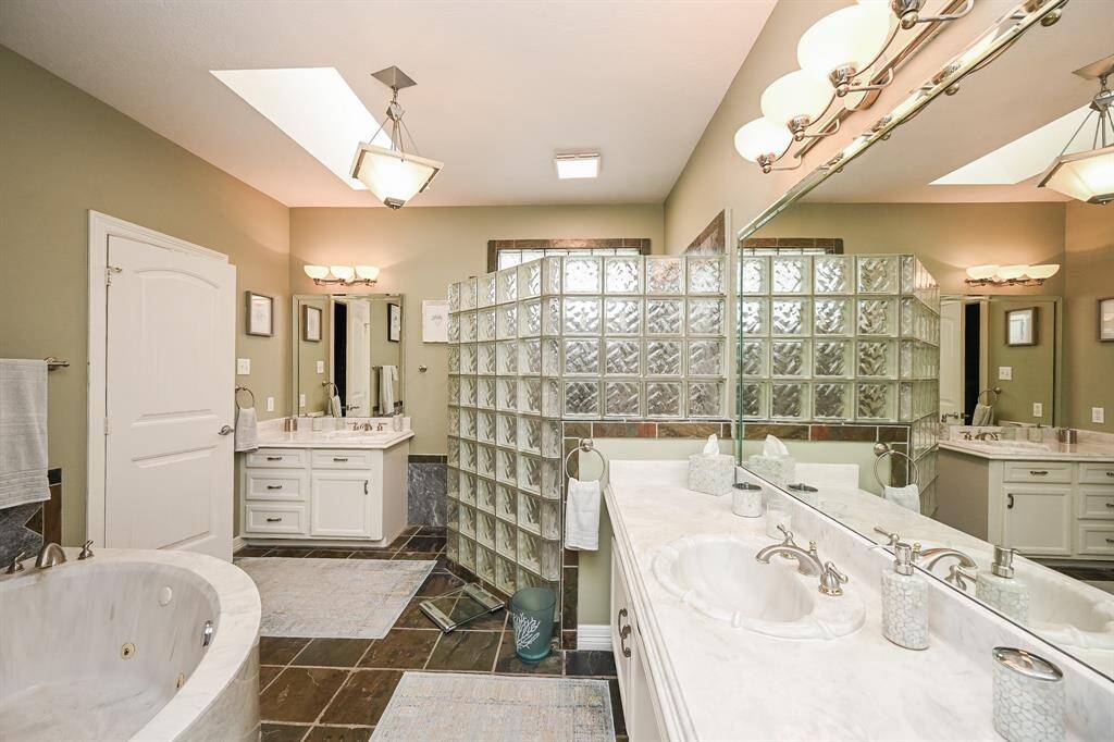 Primary bath. Includes a soaking bath tub and walk in shower.