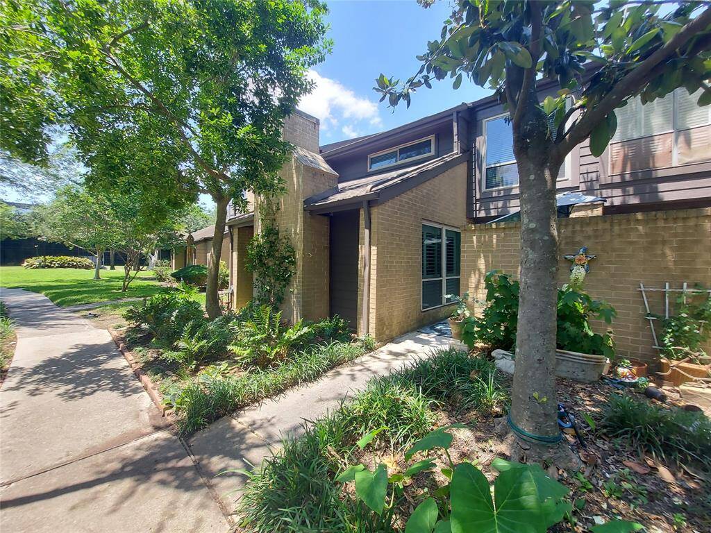 What a Find! This cozy 3 bedroom 2.5 bath townhomes is ready for you! If you like plants and landscaping this home has it all! And wait there is more!