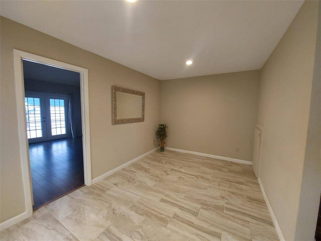 Another view of the dining room with recent tile installed.