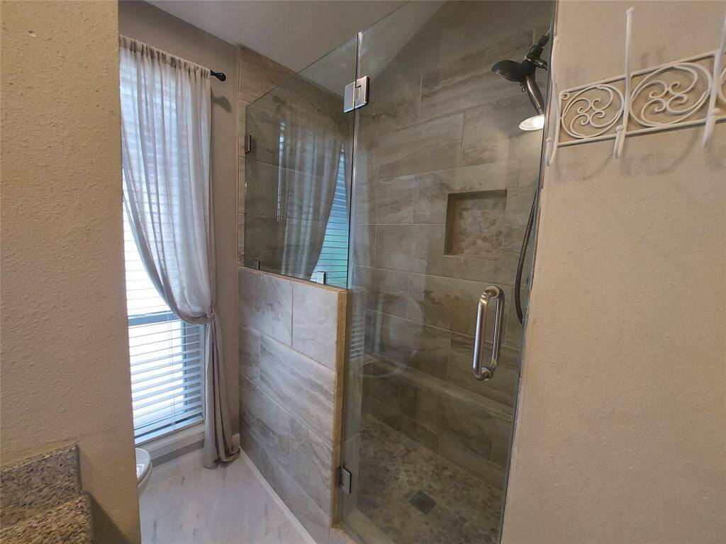 Custom shower for the master bath with set in for your shampoo!