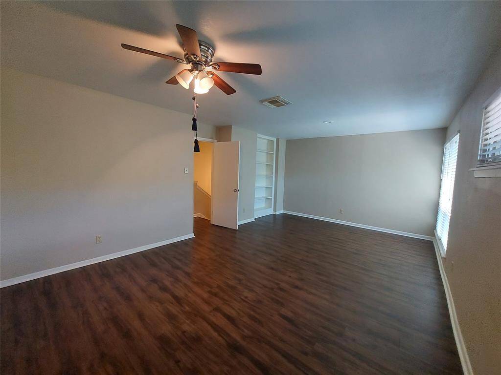 Very large second bedroom upstairs. You will not have a problem putting furniture in this bedroom.