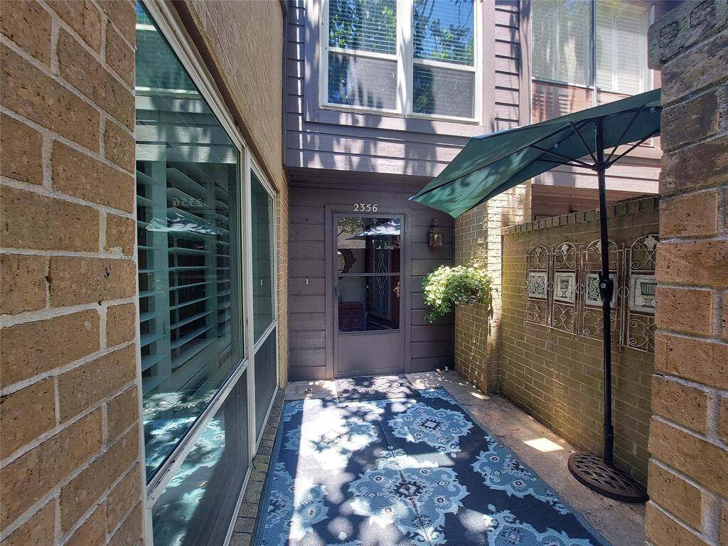 This beautiful townhome has its own private entrance with room for outdoor lawn chairs and MORE Plants!!