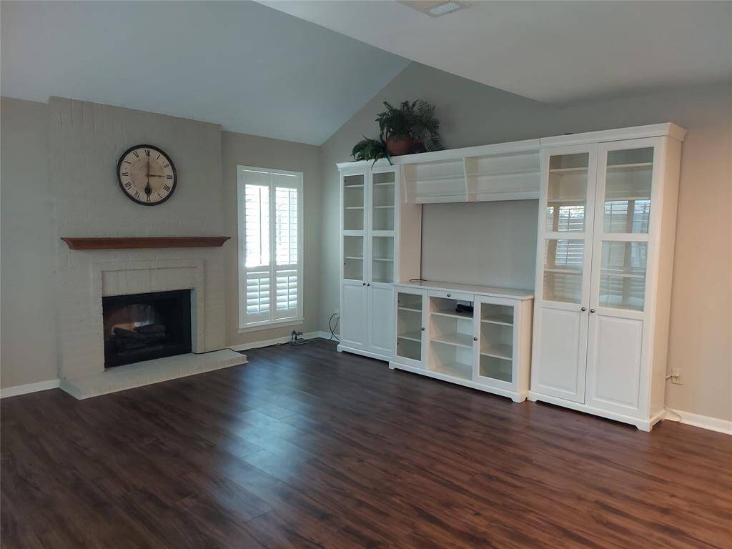 This seller is leaving this gorgeous entertainment center for the new owner. Relax by your fireplace and enjoy townhome living. Low-E windows have been recently installed with custom made shutters!