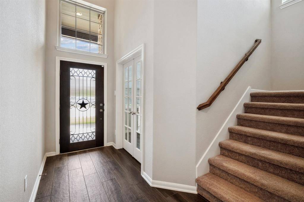 Foyer to the upstairs and office/ possible 5th bed