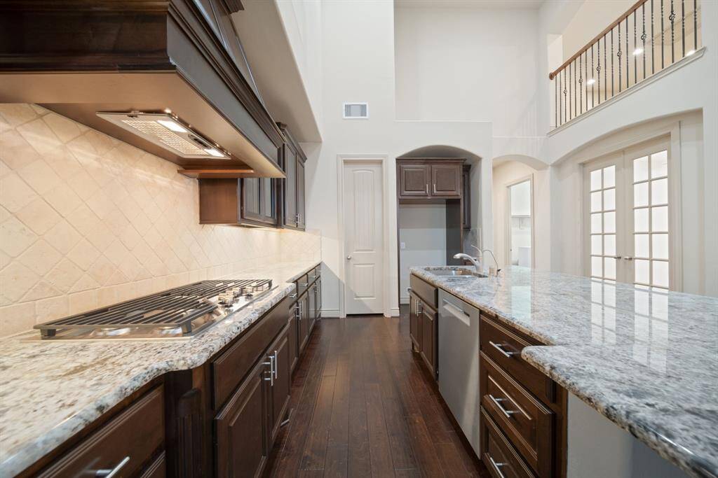 Kitchen features a 5 burner gas stove stop & double ovens!
