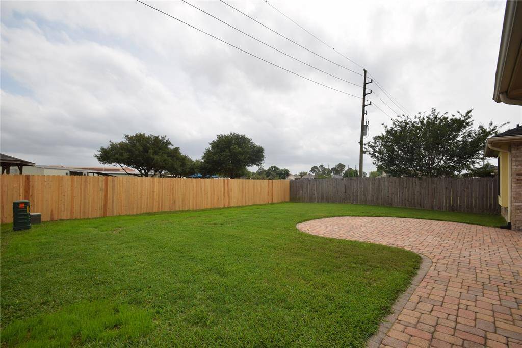 Fully fenced backyard.