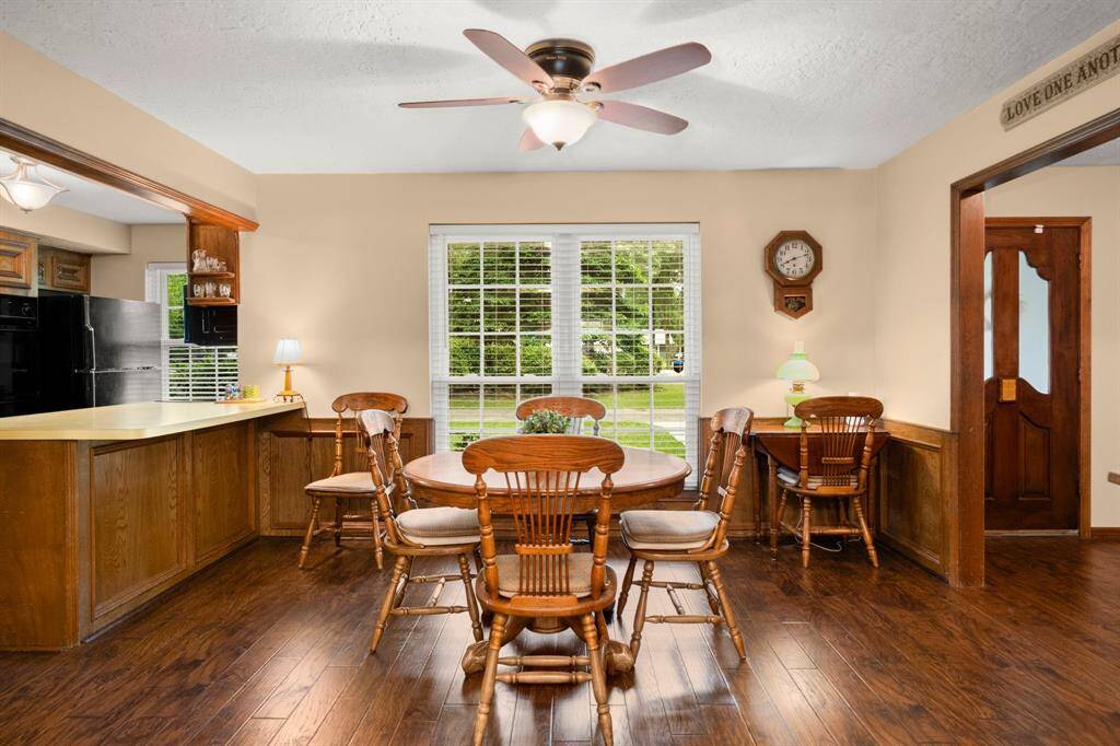 Start your day with a warm cup of coffee and a peaceful view of the wooded front yard. The breakfast bar is just right for chatting and flipping pancakes with the kids.