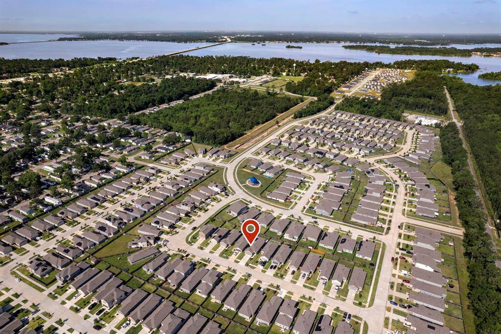 Newer construction 1 story home with 4 bedrooms near Lake Houston ready for you. Ask about the solar panels and security system available with this home.