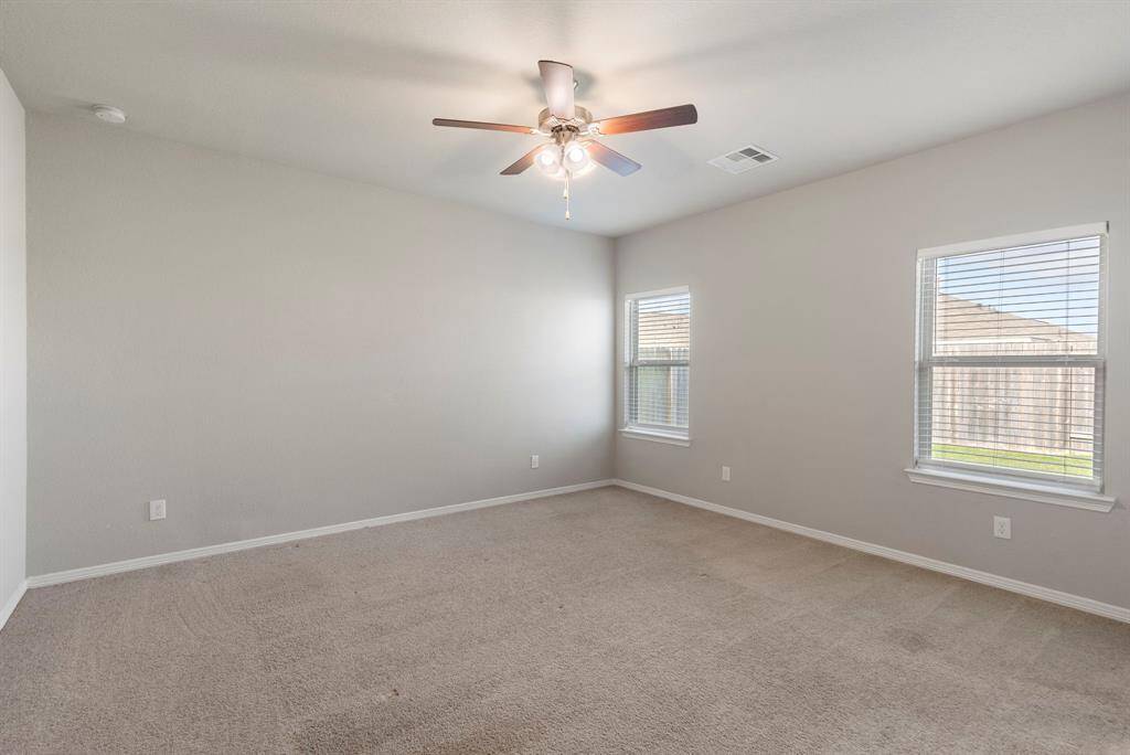Primary bedroom is tucked away on it's own wing for additional privacy.