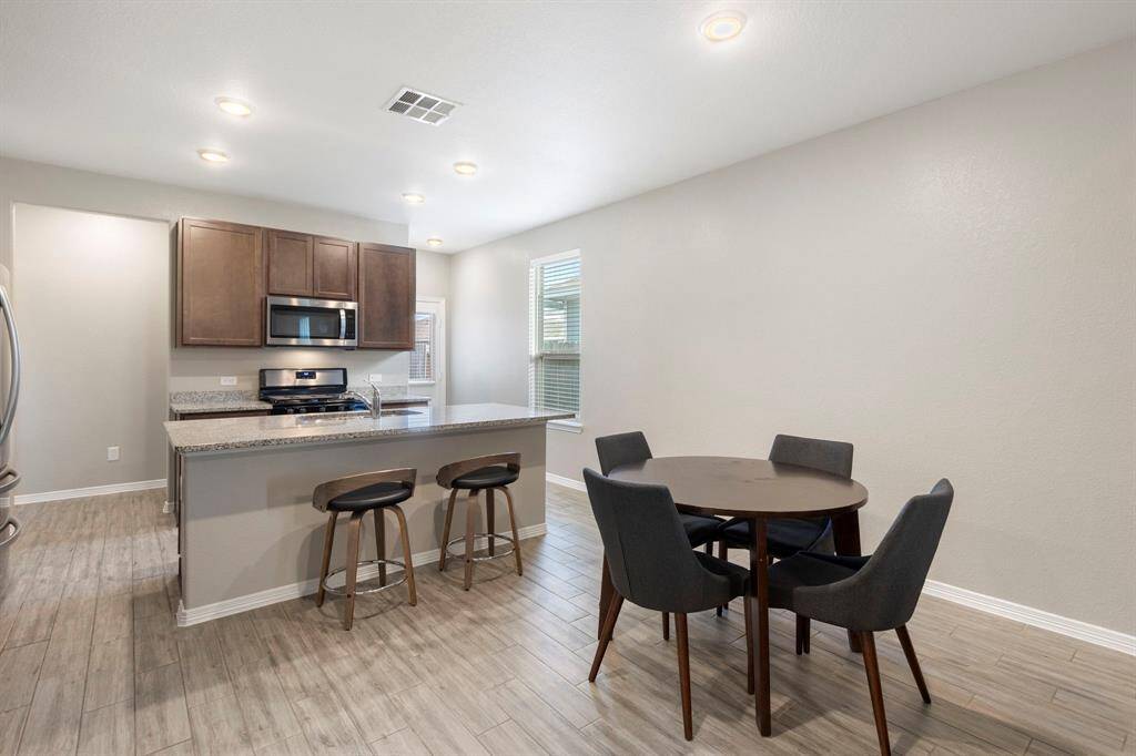 Breakfast room area will be a great place to gather with family to discuss the upcoming days events