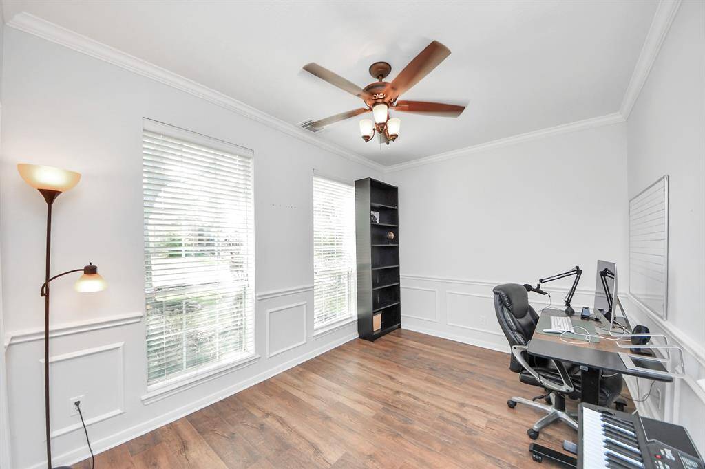 View of the study/office located behind french doors in the front of the home!