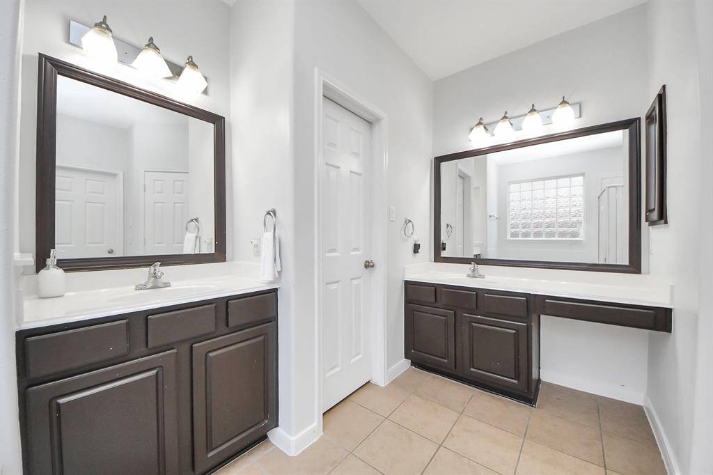 Primary bathroom with his and hers vanities!