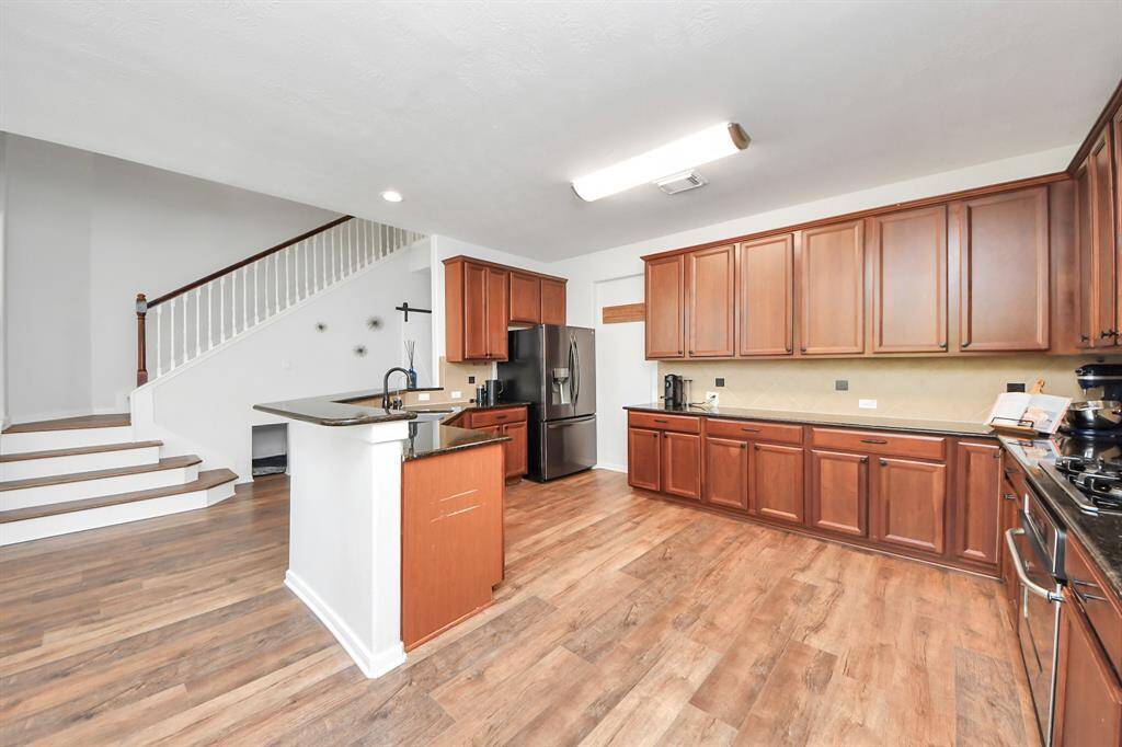 Plenty of cabinet space in this open kitchen!