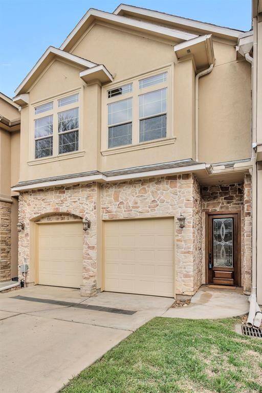 This charming townhome boasts a beautiful exterior.