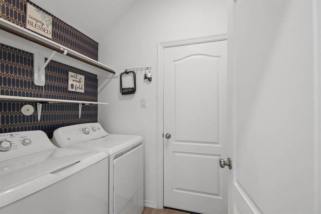 Tucked in nicely in the first floor we will find this nice looking utility room with enough space to fit separate washer and dryer machines.