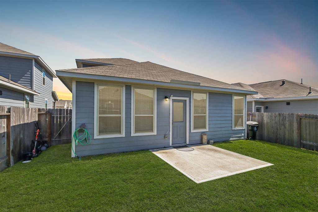 Welcome to your new backyard! Check out all of that wonderful green space for the kids and pets to run around in.