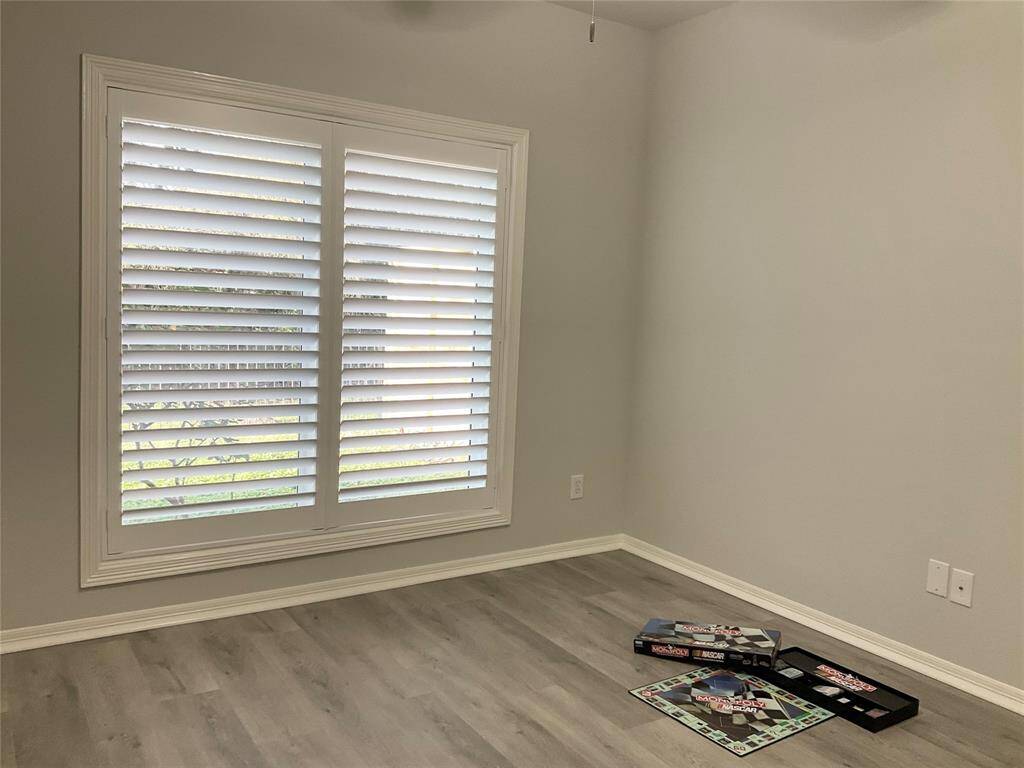 Split floor plan with the secondary bedrooms on the opposite side of the home.  Bedroom number two window, freshly painted, new flooring, ceiling fan, double pane windows,, plantation shutters and a double door closet.  Move in ready today!