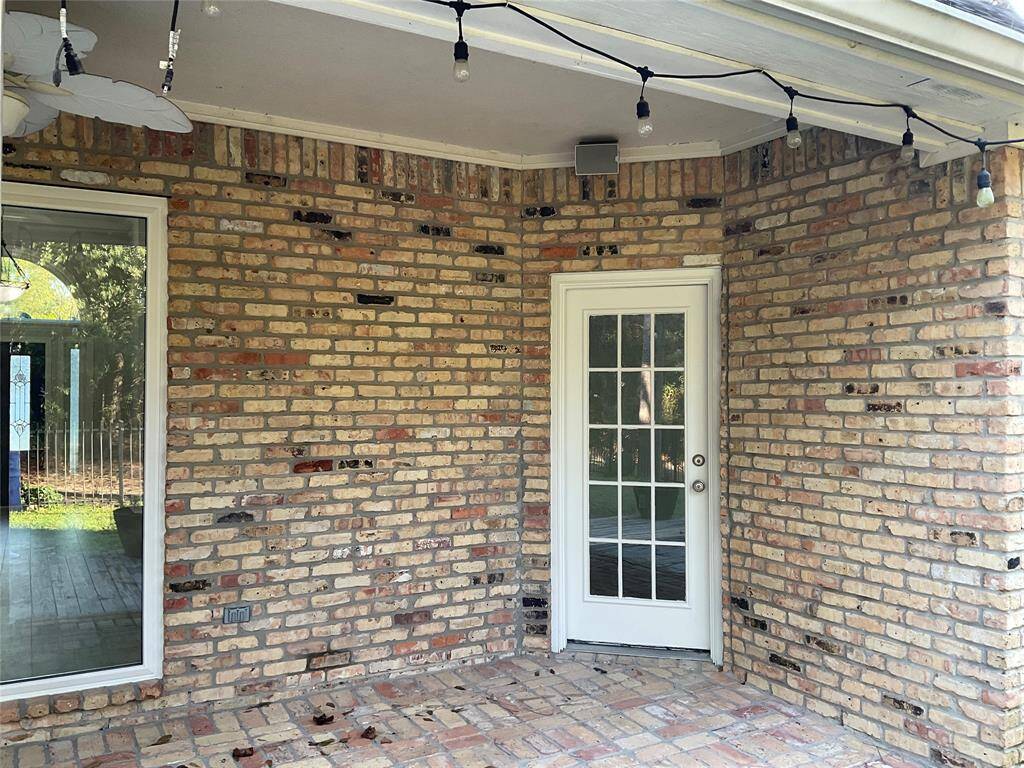 Coffee in the morning on your private patio.  This is one of 2 doors leading to the covered patio for enjoyment come rain or sunshine.