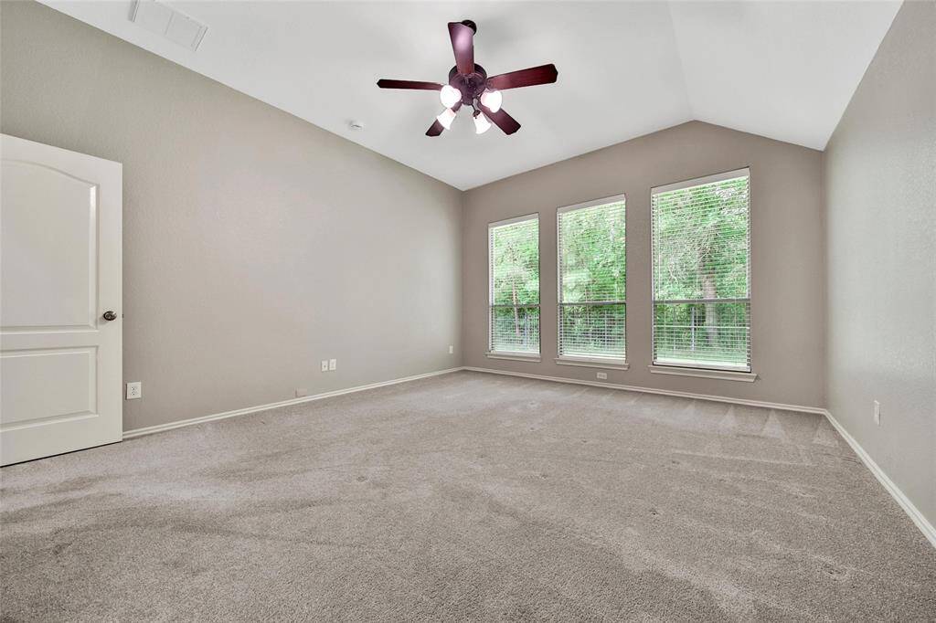 The spacious owner's suite accommodates large furniture.