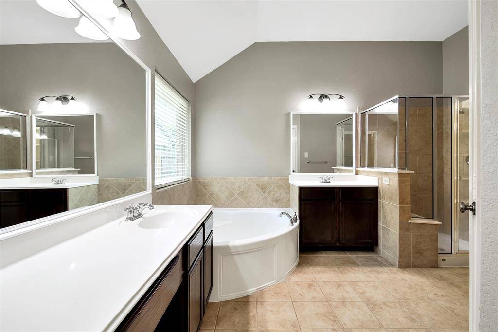 It's easy to share in this space with double sinks and a large vanity.