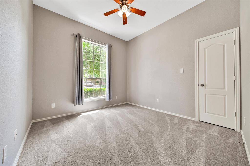 Secondary bedrooms are light and bright with generous closet space.