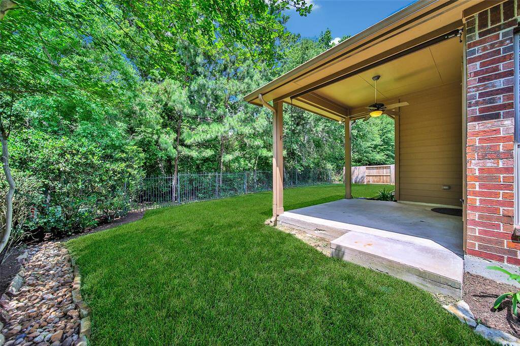 The deep covered patio is perfect for all-weather enjoyment.
