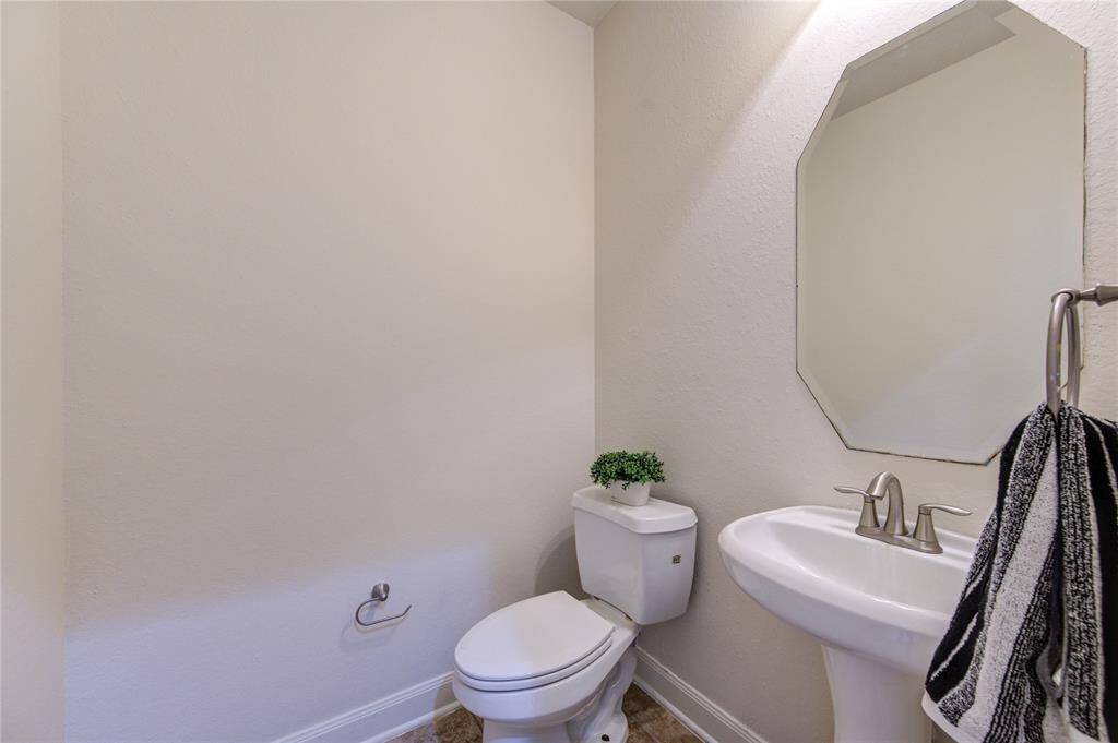 Half bathroom in the first floor is quite convenient for your family or guests.