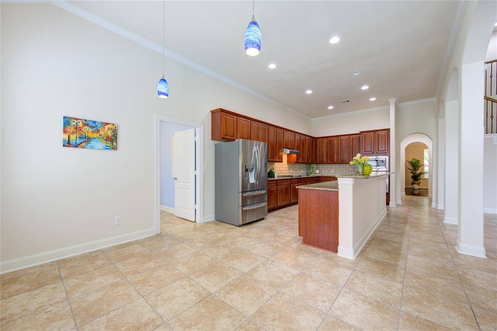 The view from the breakfast area to the kitchen. Plenty of space and storage for all your needs.
