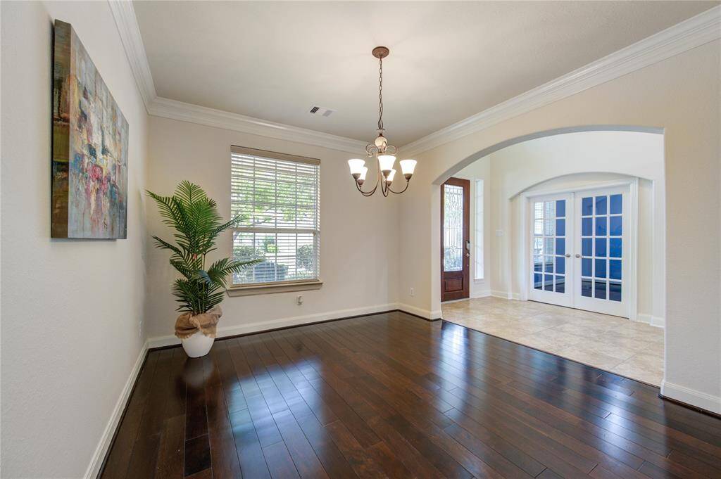 Formal dining space is connected to the kitchen. Perfect for all gatherings.