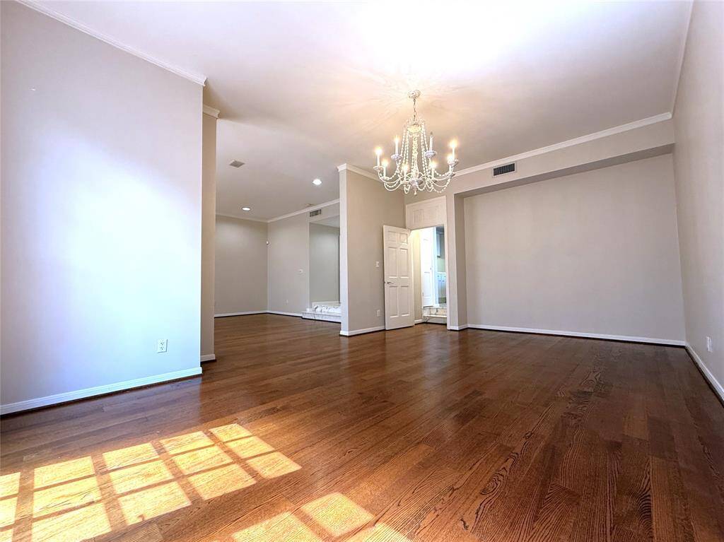 A door from the kitchen opens into the spacious formal dining room.
